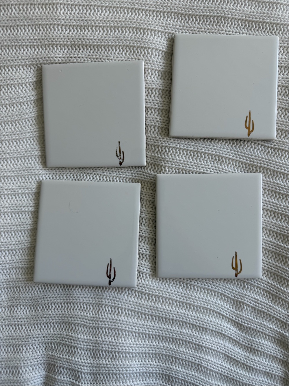 Neutral White Ceramic Coasters with Gold Cactus Accent